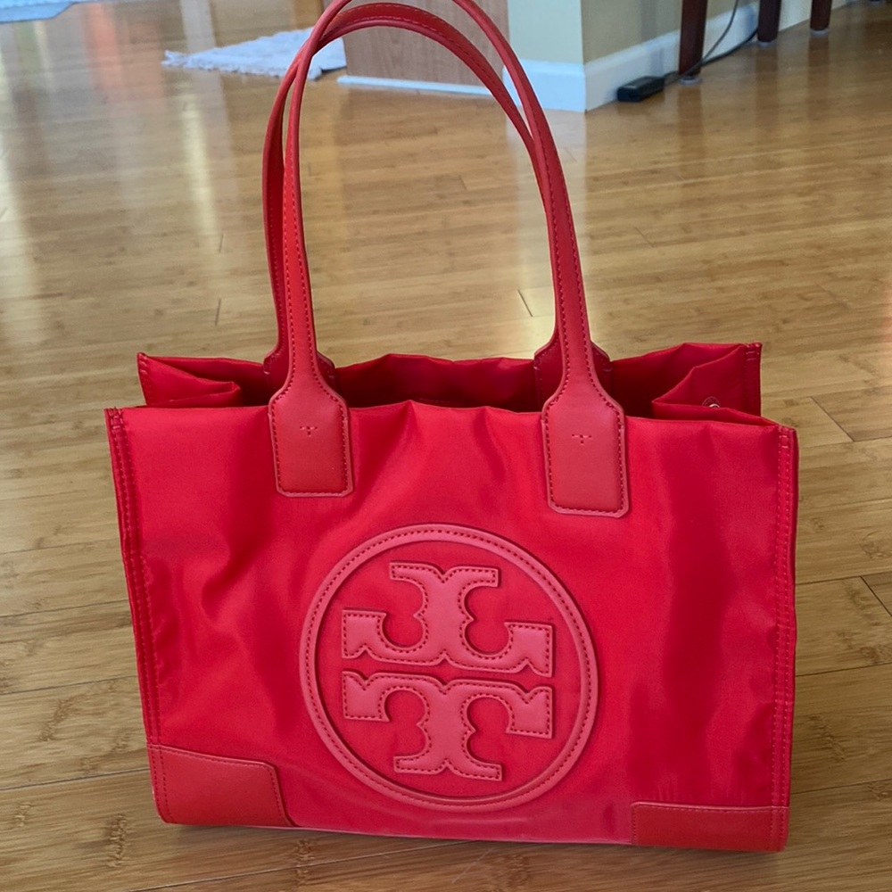 Tory Burch red nylon tote. 13 1/4” x 10 1/2” x 3 1/2” deep